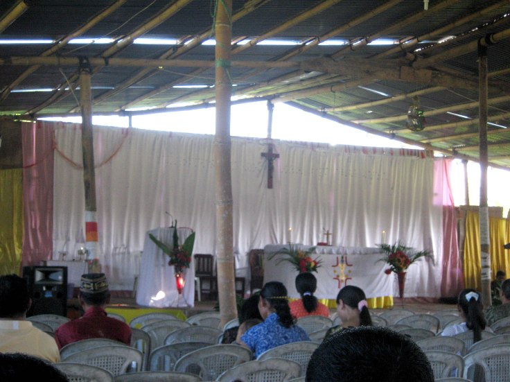 Sunday mass in bamboo church with tin roof (2 June 2013)
