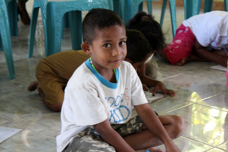 Angel pauses in class for a photograph (2 June 2013)