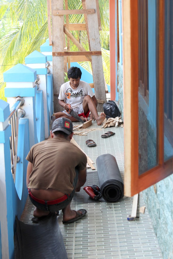 Building and fitting mosquito screens for the monastery (4 June 2013)