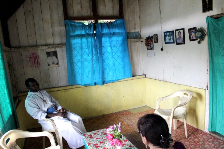 Visiting widow's home (5 June 2013)