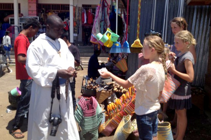 Girls learning to shop at the local markets with Brother Emmanuel