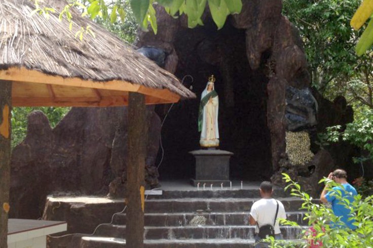 Praying at the grotto