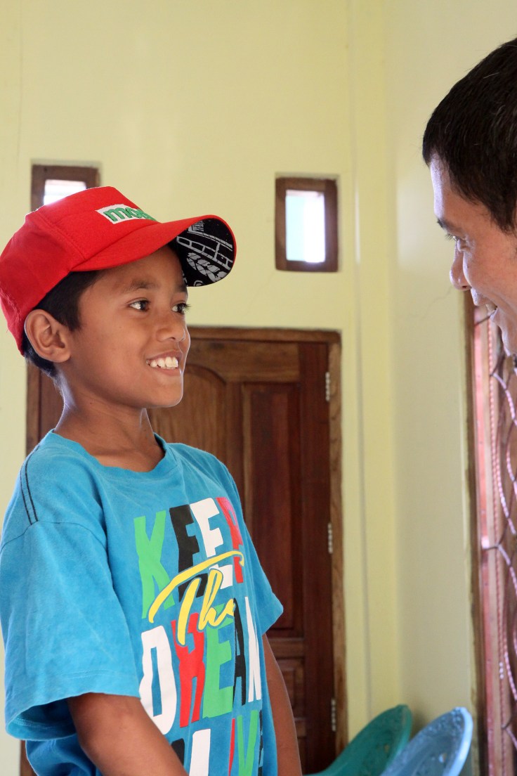 Happy with his tee shirt
