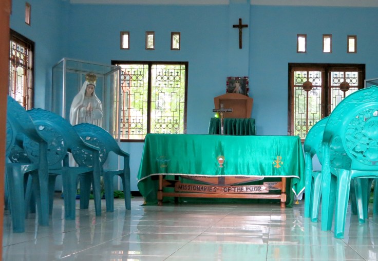 Time for the rosary, the chapel has a new hand carved altar and a beautiful altar cloth