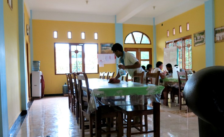 Brothers clean up after lunch