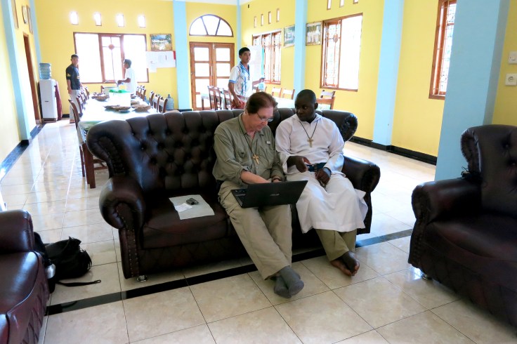 Reviewing the local sponsorship children with Brother Emmanuel