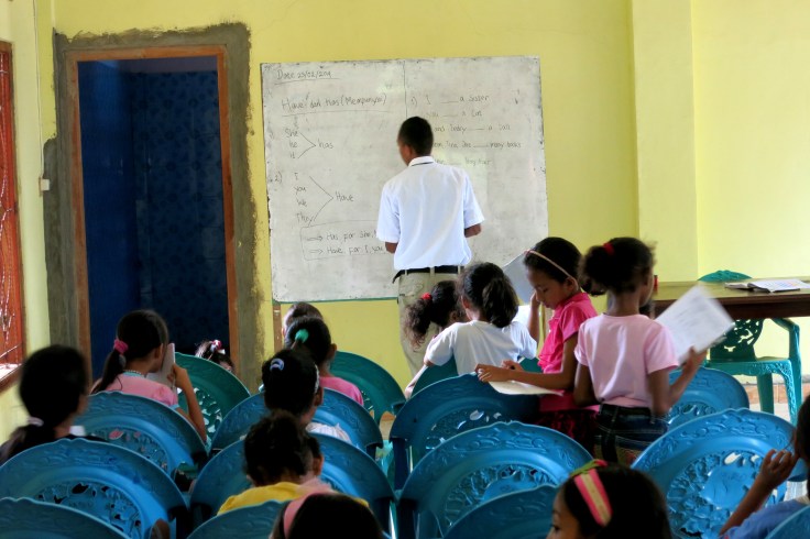 Young brothers do a great job teaching English to the class