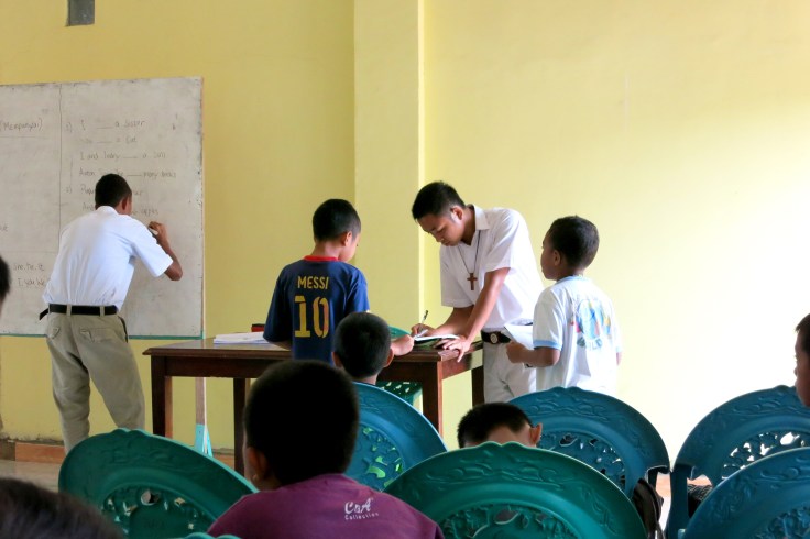 Correcting the children's work