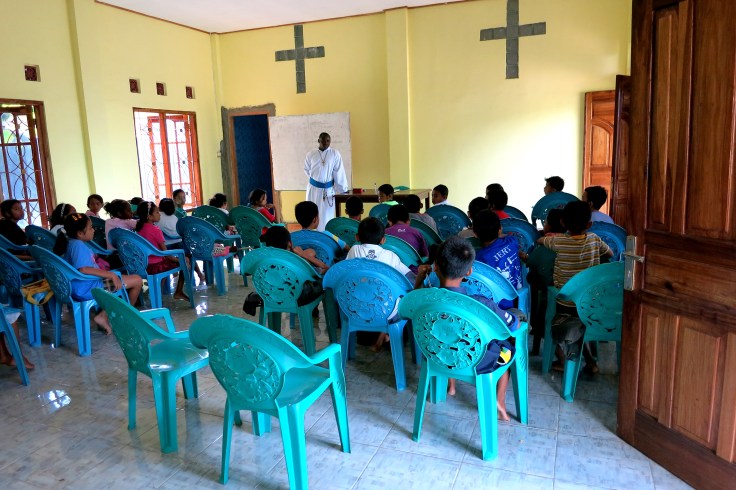 Br Emmanuel speaks to the class about dental hygeine