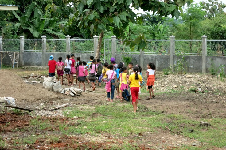 Children walk home after English class, see you next week