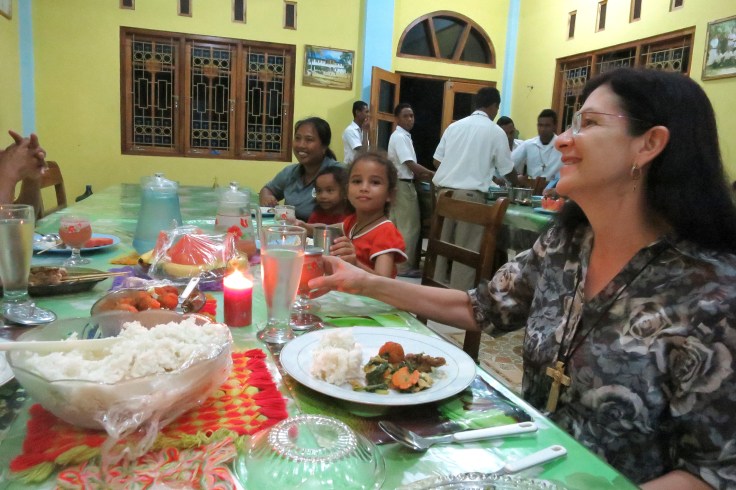 31. Sharing dinner with sponsor children and their families