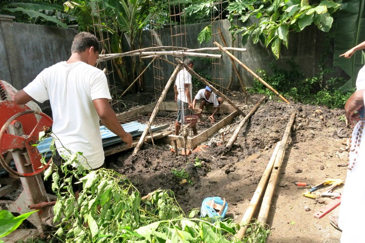 Installing water tank for apostolate (February 2014)