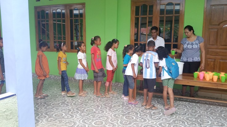 Michele helping out with the usual feeding programme after English lessons