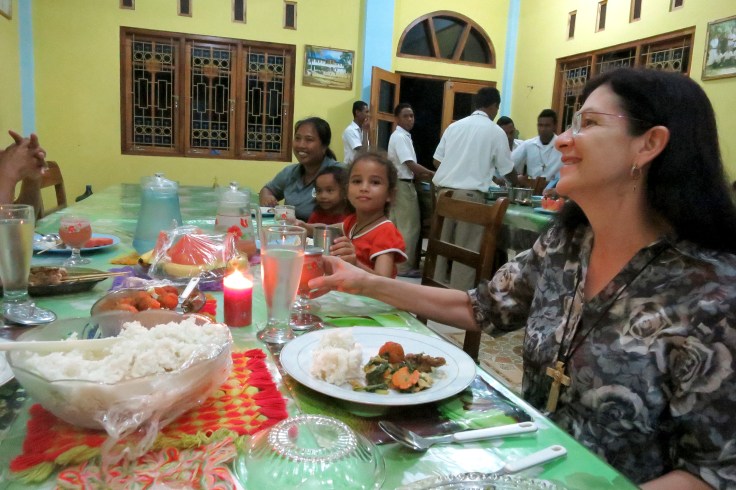 Melani sharing dinner at the monastery with Devon's Mum and brother, with Tina in foreground (2015)