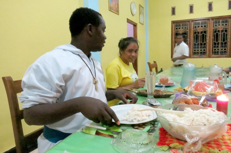 Melani's Grandma sharing dinner at the monastery, Br Emmanuel in foreground (2015)