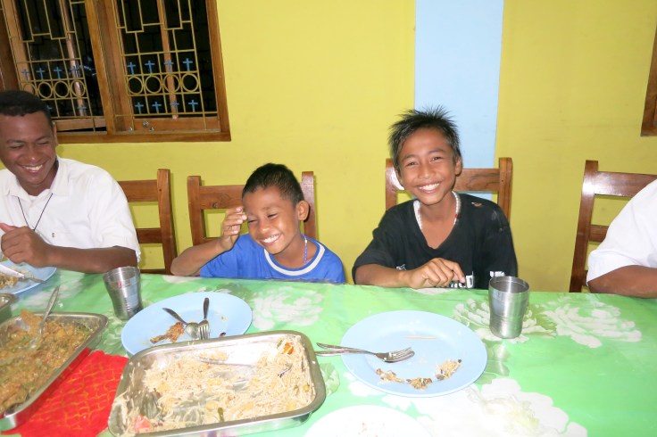 Devon on right with Angel on left at dinner with the brothers