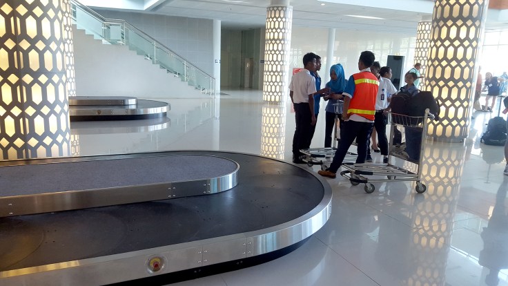 6. A different view. Very nice airport arrivals hall with the same three trolleys