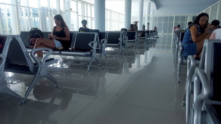 9. Departure lounge is very modern with plenty of seating, ...