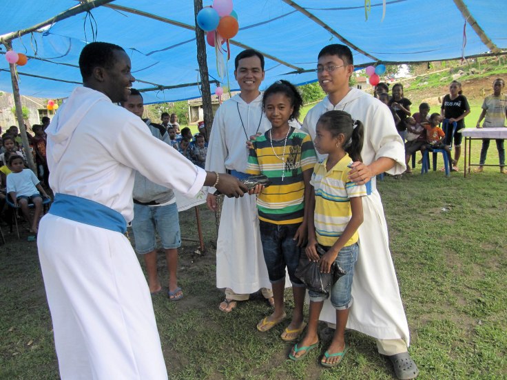 3. Gifts for two girls, including Rosaries