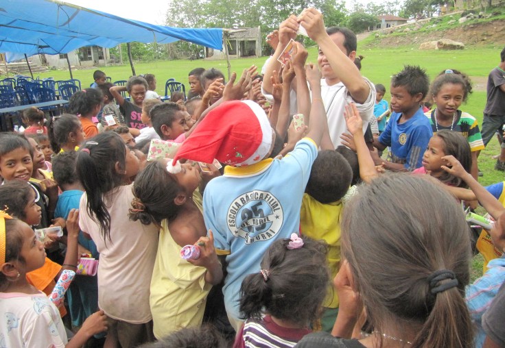 5. Br Jimmy gives out Holy Cards after the Christmas celebration