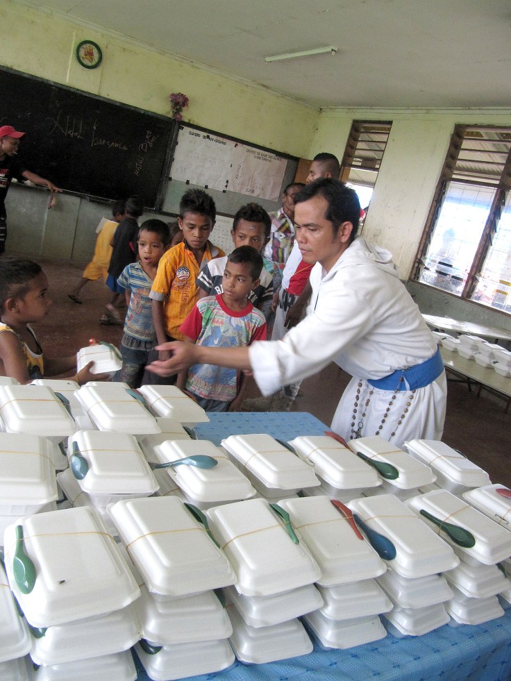 8. Children's feeding program with Br Jimmy