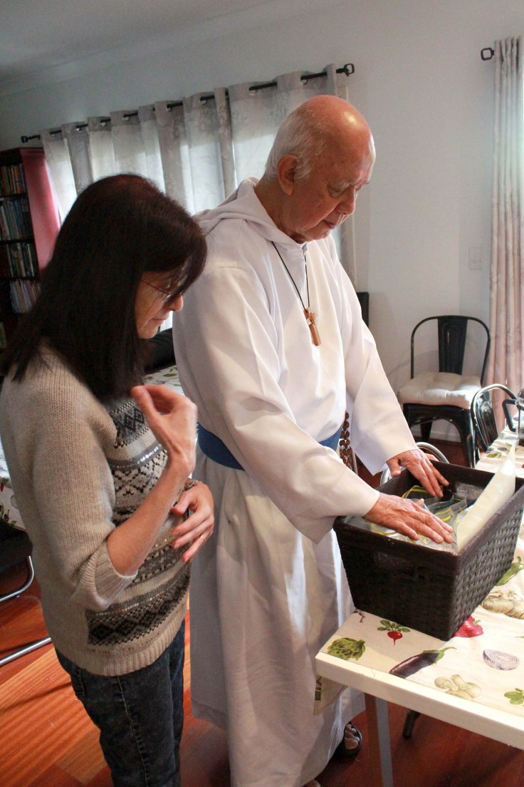 15. Father blessing our handmade rosaries