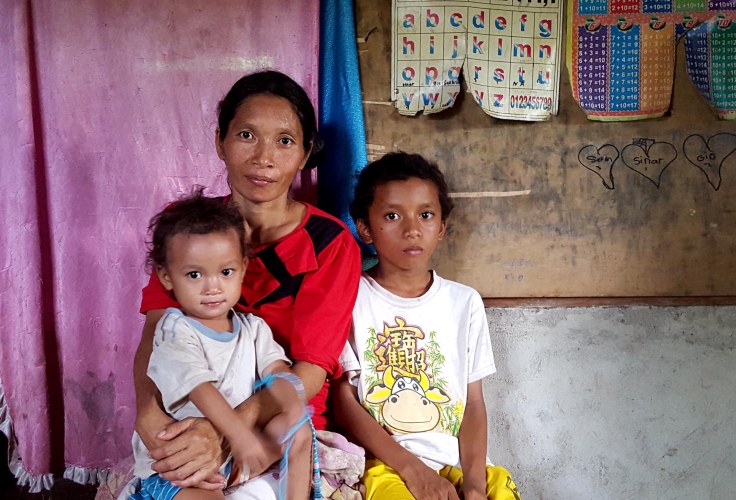 Giu with mum and baby sister Faustina