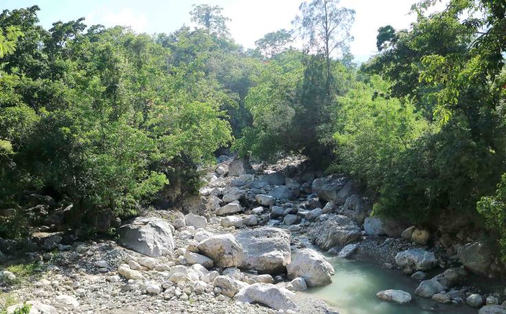 travelling-over-one-of-the-creeks-up-to-saburai