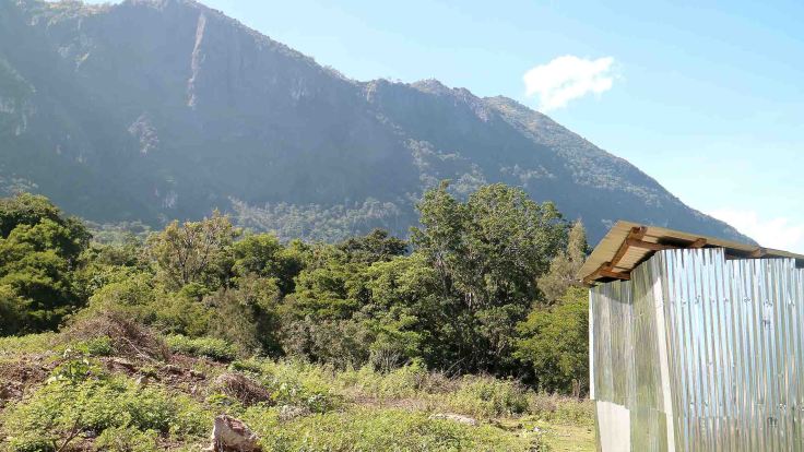 we-reach-the-brothers-property-looking-up-to-saburai-mountain-their-shed-in-the-foreground