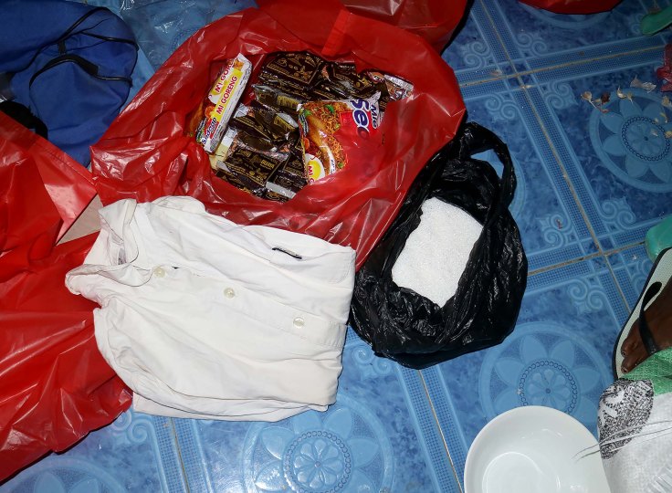 4-food-parcel-contents-sugar-rice-noodles-coffee-and-a-piece-of-clothing