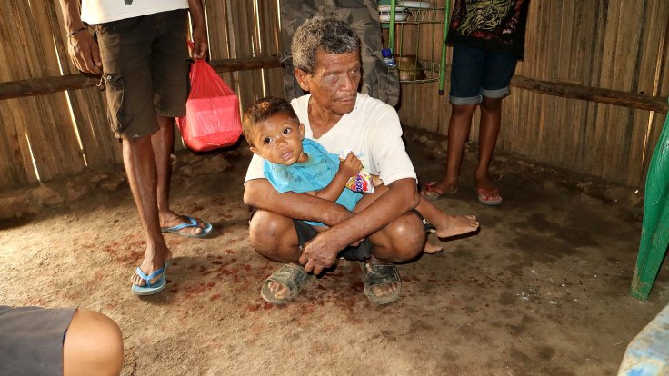 IMG_0714 No 23 One of the lepers who is in remission holding his grandson