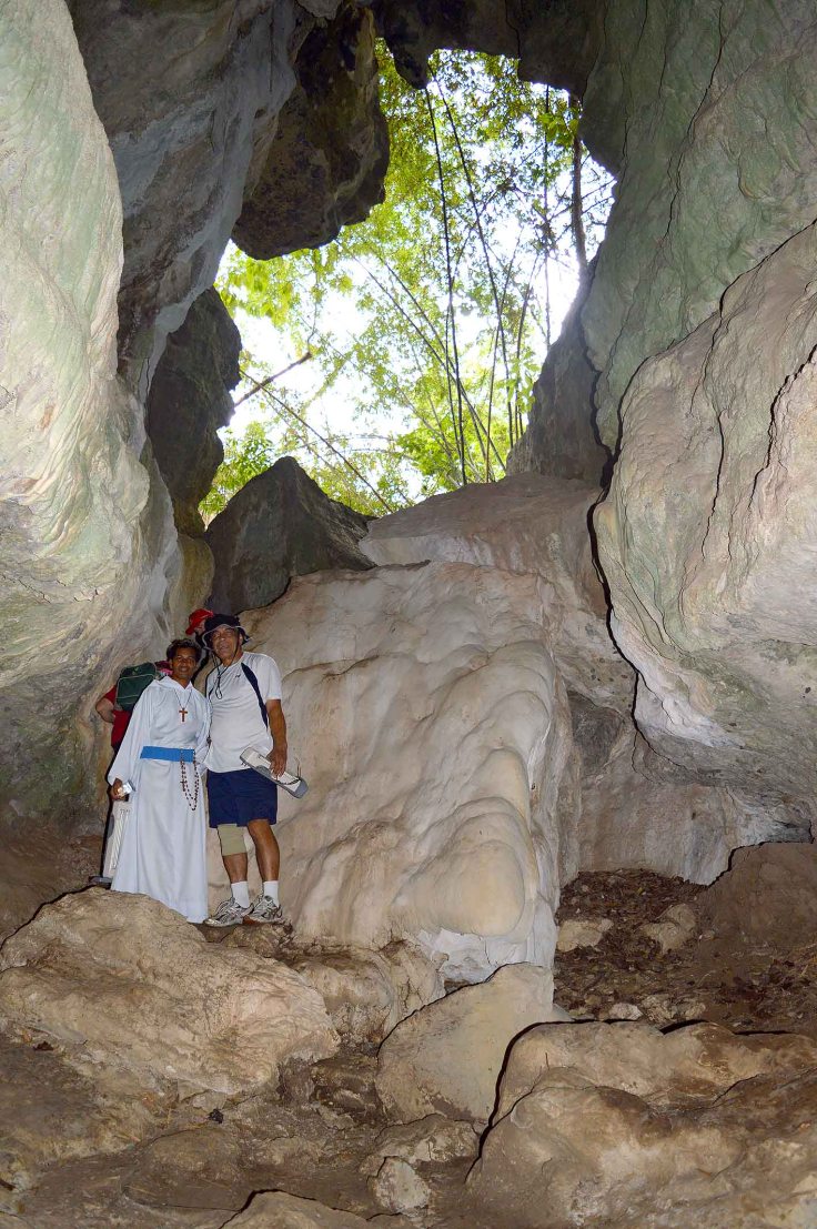 6. Br Sudia with Georges exploring the cave