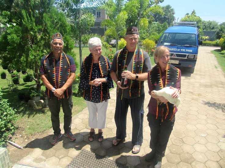 1.Some of the visitors arriving at the mission in Labuan Bajo, and greeted with the traditional chicken