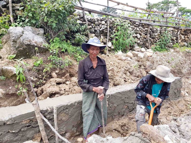 2. Women constructing a new drain