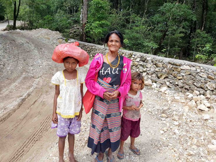 4. Locals walking up the road